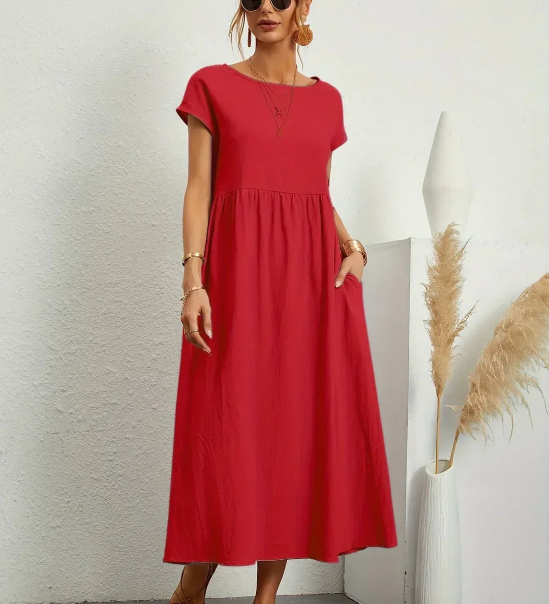 Gunta – Plūstoša midi kleita mūžīgai elegancei
