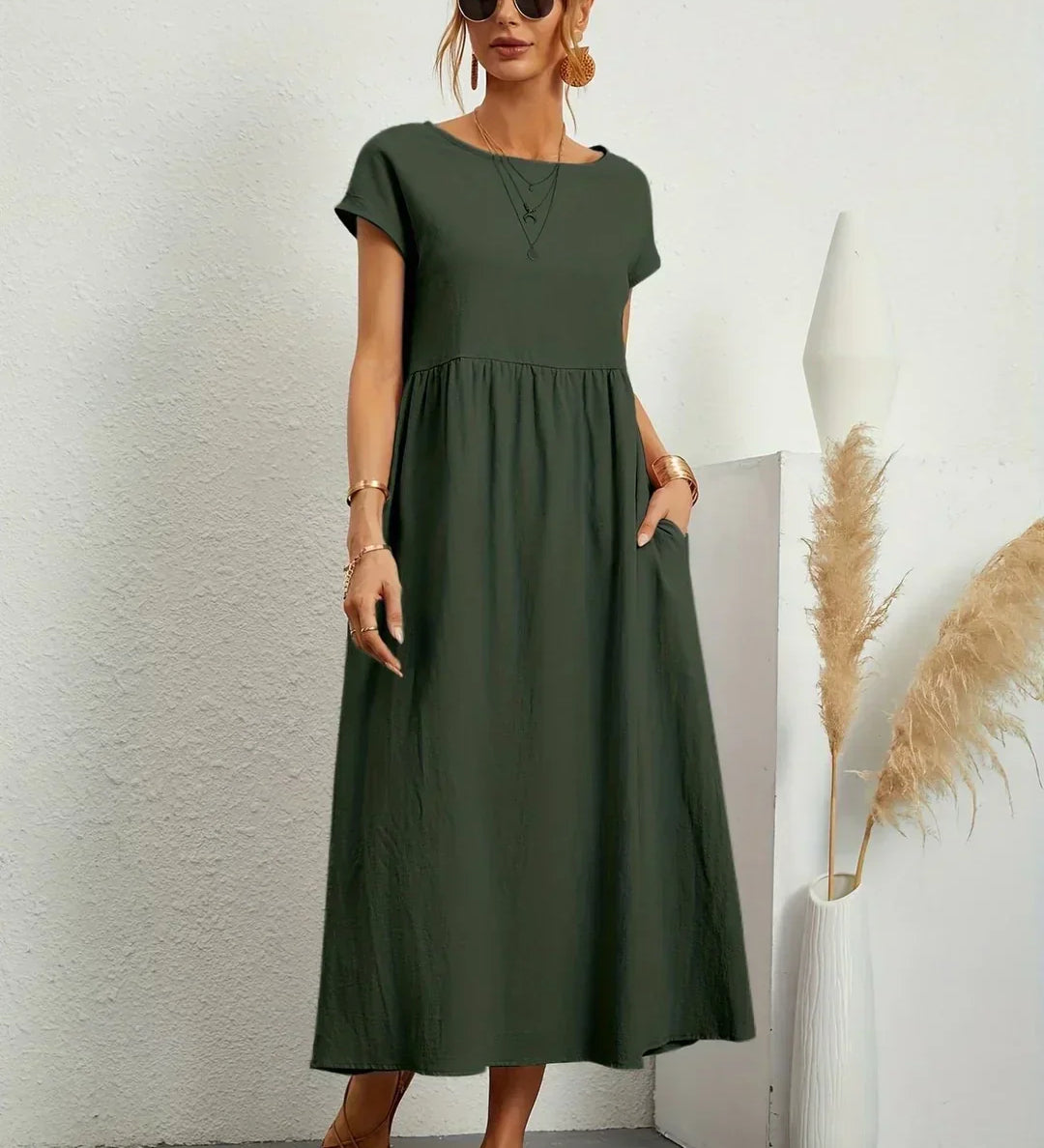 Gunta – Plūstoša midi kleita mūžīgai elegancei