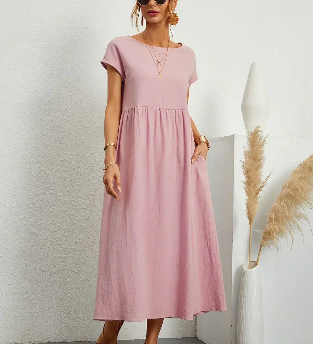 Gunta – Plūstoša midi kleita mūžīgai elegancei