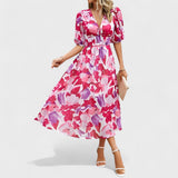 Jorė – Elegantiška gėlėta midi suknelė