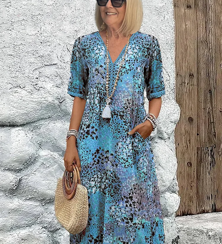 Gita – Spilgta midi kleita, eleganti maskējot vēderu